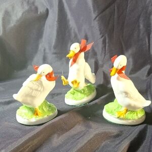 Charming Ceramic Duck Figurines with Red Bows